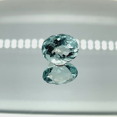 Natural aquamarine, 8.75 carats, roundish oval cut, eye clean clarity, untreated, vivid blue