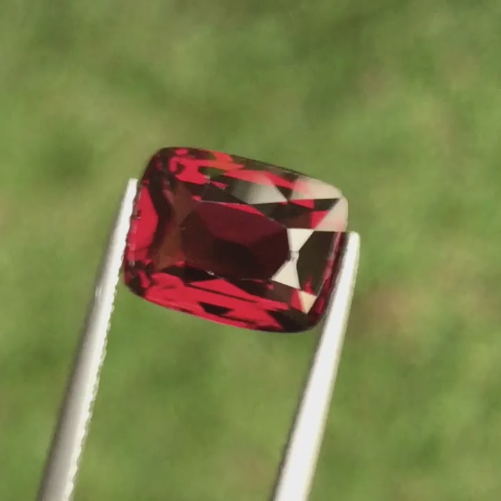 Natural rhodolite garnet, 4.14 carats, cushion cut, VS–VVS clarity, untreated, red gemstone