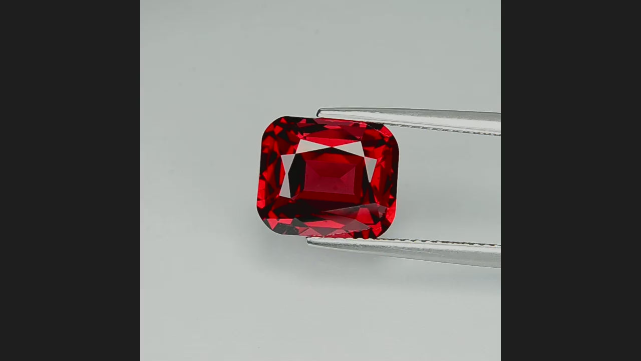 Natural rhodolite garnet, 4.68 carats, cushion cut, VVS clarity, untreated, red gemstone