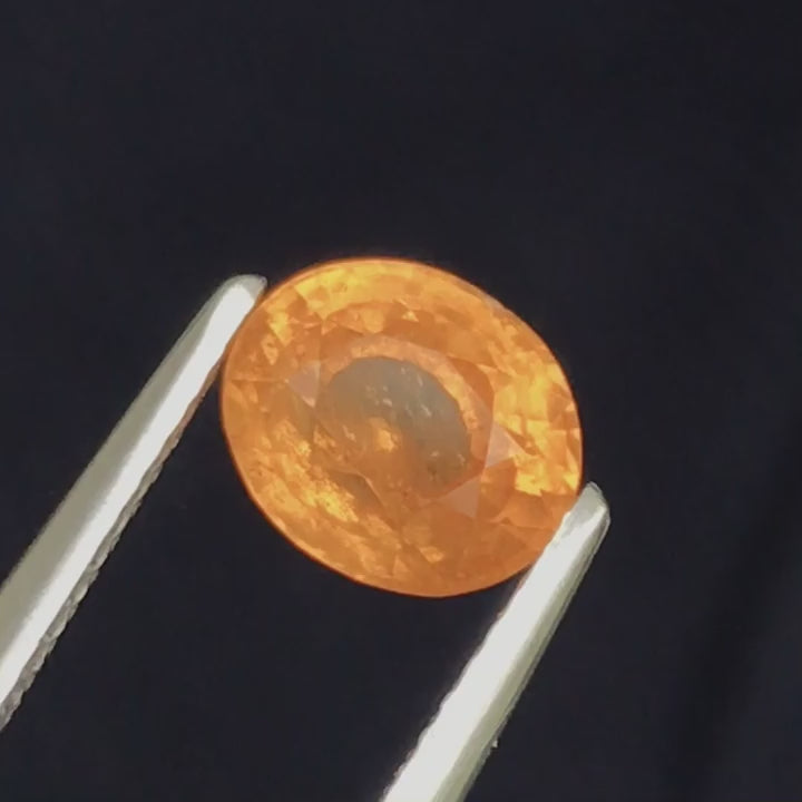Natural spessartite garnet, 2.22 carats, oval cut, SI clarity, untreated, orange gemstone