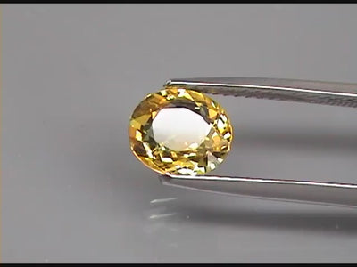 1.84 ct bi-color yellow-blue sapphire from Australia, oval cut, heat treated, VS–VVS clarity