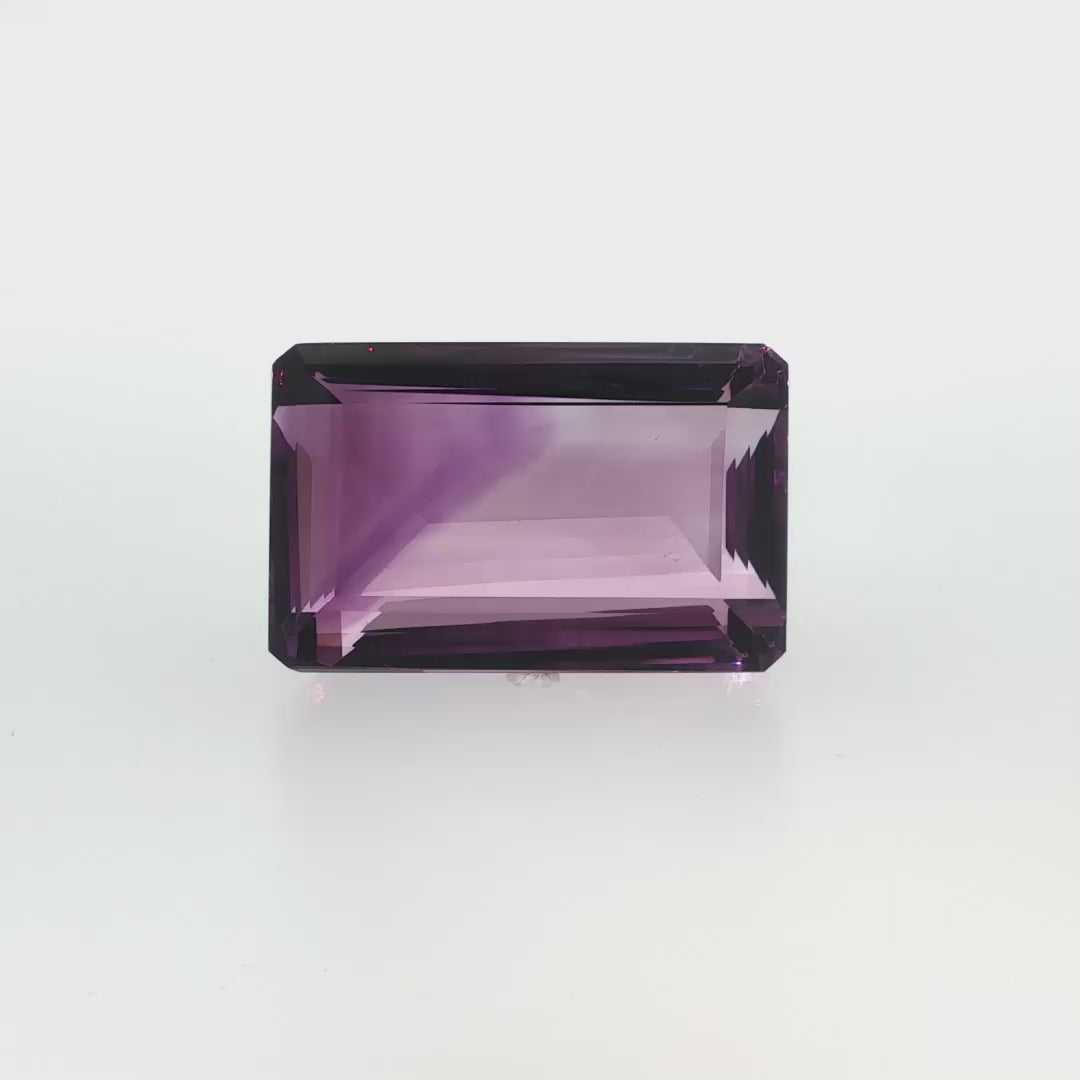 Natural amethyst, 144.05 carats, emerald cut, clarity: eye clean, purple color, measuring 36.80 × 23.60 × 17.48 mm