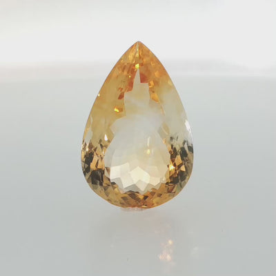 Natural citrine, 31.13 carats, pear cut, golden-yellow color, measuring 27.40 × 18.31 × 11.46 mm