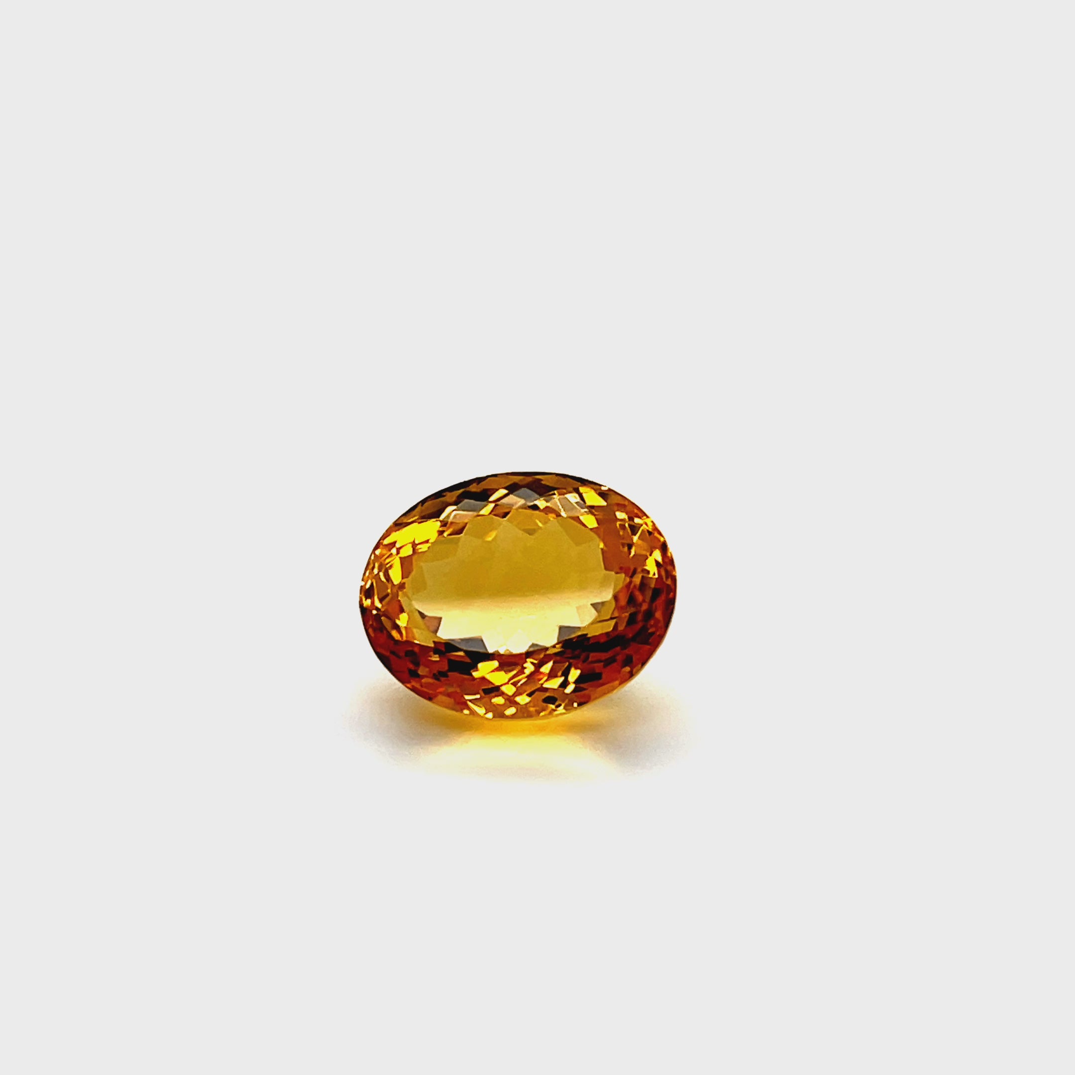 Natural citrine, 15.95 carats, oval cut, VVS clarity, heated, yellow / orange, ČGL certified