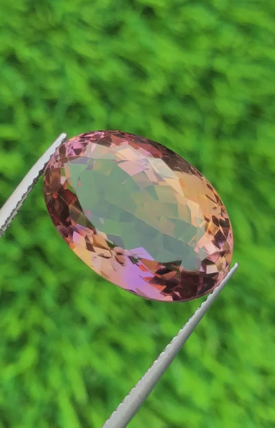 Natural Ametrine 18.40 carats, fancy oval cut, purple-yellow bi-color gemstone from Bolivia, untreated