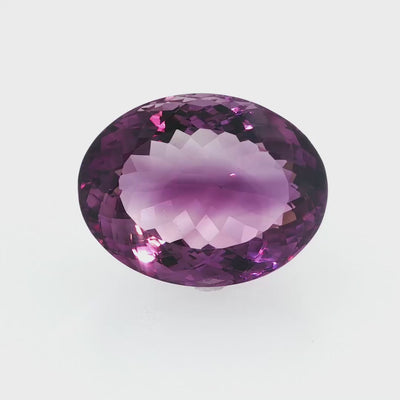 Natural amethyst, 53.78 carats, oval cut, clarity: eye clean, rich purple color, measuring 28.32 × 21.93 × 14.54 mm