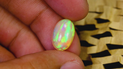 Natural Welo opal, 2.60 carats, oval cabochon cut, untreated, multicolor play-of-color, Ethiopia