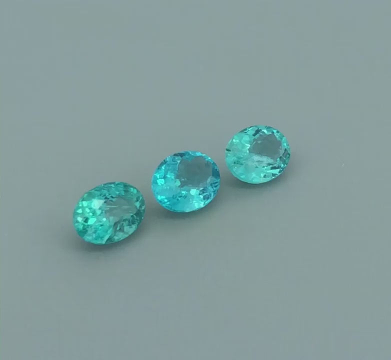 Set of 3 Natural Apatite gemstones, total 3.85 carats, oval cut, light blue color, untreated