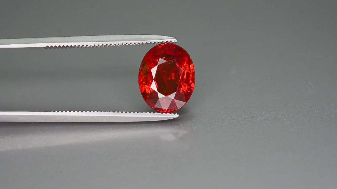 Natural spessartite garnet, 3.15 carats, oval cut, SI clarity, untreated, red gemstone
