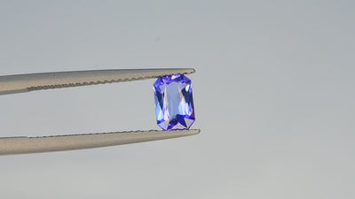 Natural tanzanite, 0.90 carats, emerald cut, eye clean clarity, heated, vivid blue