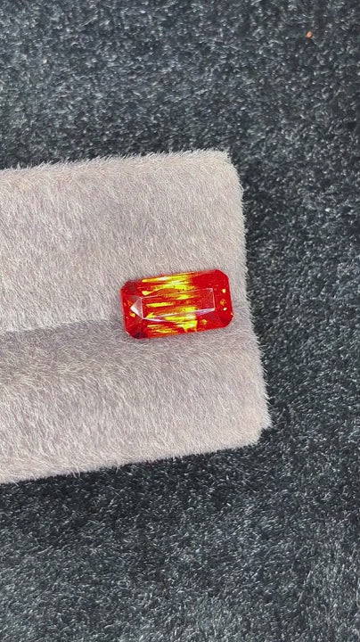 Natural sphalerite, 5.13 carats, fancy emerald cut, VS clarity, untreated, orange-red hue