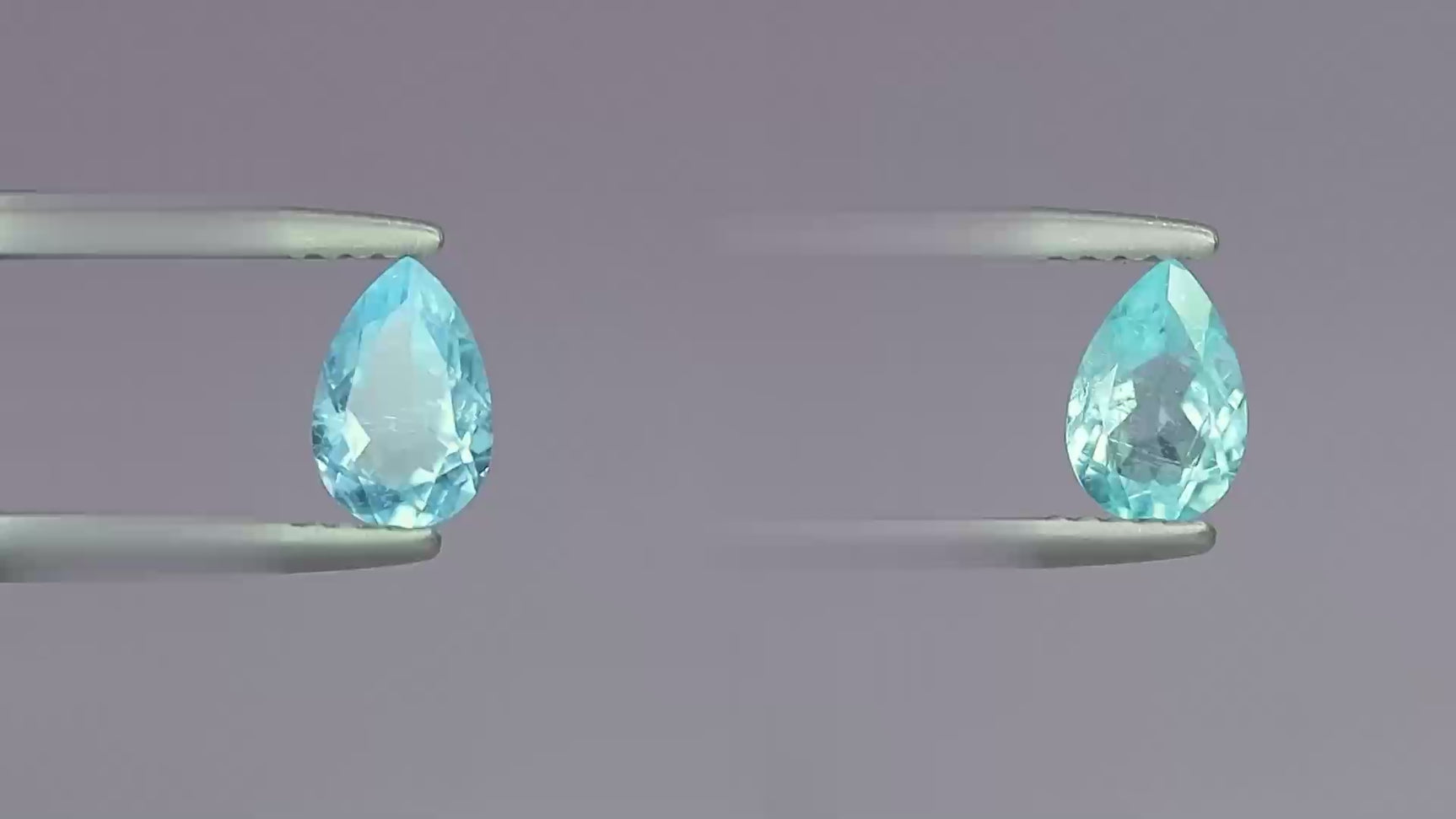 Natural Paraiba tourmaline pair, 1.21 carats total, pear cut, heated, greenish-blue, GIA certified