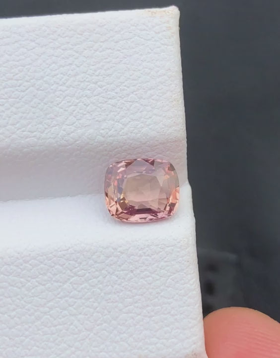 Natural Padparadscha sapphire, 1.54 carats, cushion cut, untreated, orange pink, AIG certified