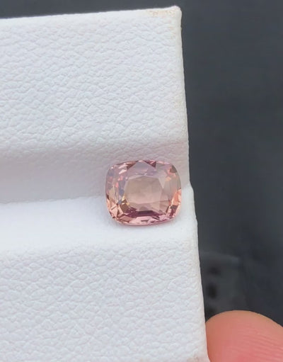 Natural Padparadscha sapphire, 1.54 carats, cushion cut, untreated, orange pink, AIG certified
