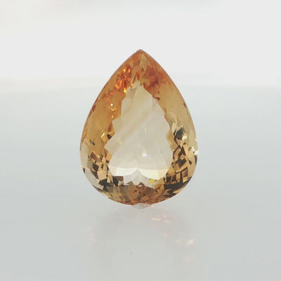 Natural citrine, 42.68 carats, pear cut, golden-yellow color, measuring 28.28 × 21.12 × 13.28 mm