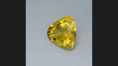 Natural yellow beryl, 9.67 carats, trilliant cut, VS clarity, heated