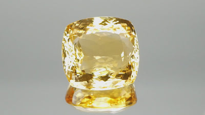 Natural citrine, 69.69 carats, cushion cut, IF clarity, slightly orange-yellow color, heated, ČGL certified