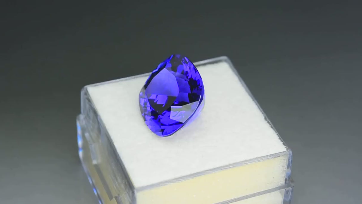 Natural tanzanite, 8.96 carats, purplish-blue color, cushion cut, heat-treated, collectible gemstone