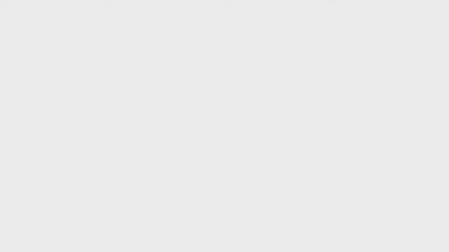 Heart-shaped champagne diamond pendant in 18K white gold with halo setting, GIA certified