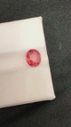 Natural Padparadscha sapphire, 1.56 carats, oval cut, pinkish-orange color, untreated, GRS certified