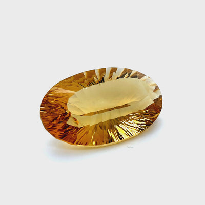 Natural citrine, 73.30 carats, oval cut, IF clarity, heated, slightly orange yellow, ČGL certified