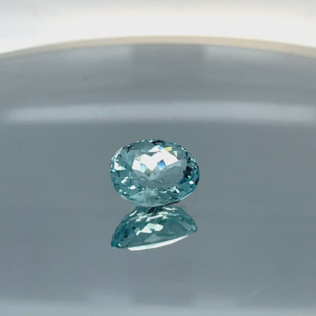 Natural aquamarine, 8.22 carats, oval cut, eye clean clarity, untreated, vivid blue