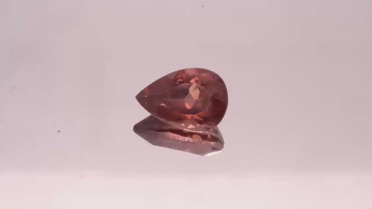 Natural Red Apatite 2.36 carats, pear cut, light orangy red gemstone, untreated