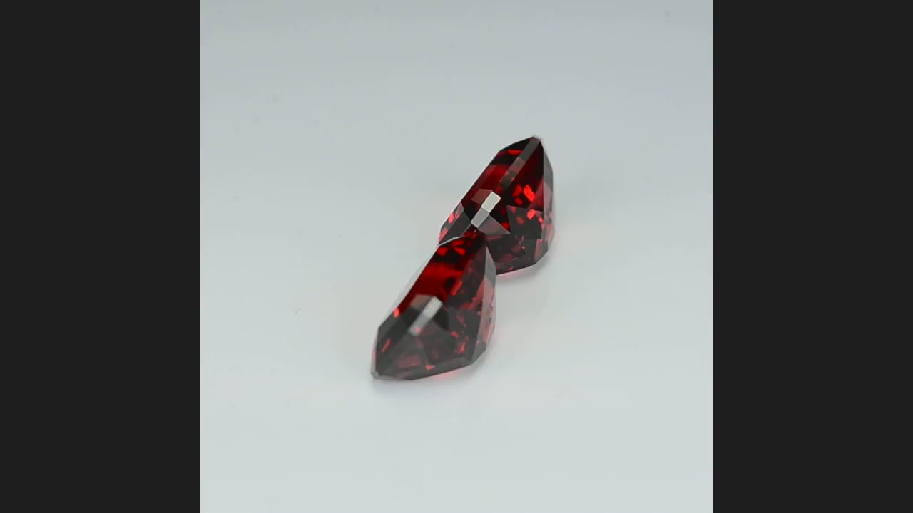 Natural garnets, 5.58 carats total, octagonal cut, vivid red, untreated, from Africa, matching pair