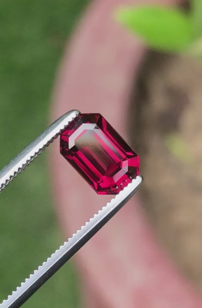 Natural umbalite garnet, 1.90 carats, rectangular cut, VVS clarity, untreated, pinkish red gemstone