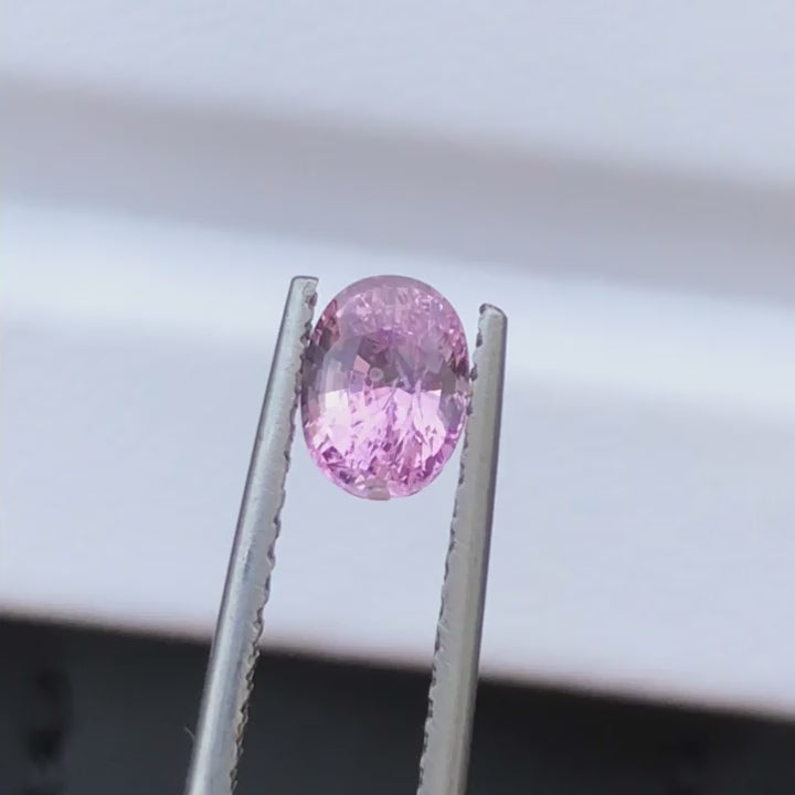 Natural Padparadscha sapphire, 1.12 carats, oval cut, untreated, pinkish orange, AIG certified
