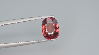 Natural red zircon, 3.00 carats, cushion cut, VVS clarity, untreated, deep red with warm undertones