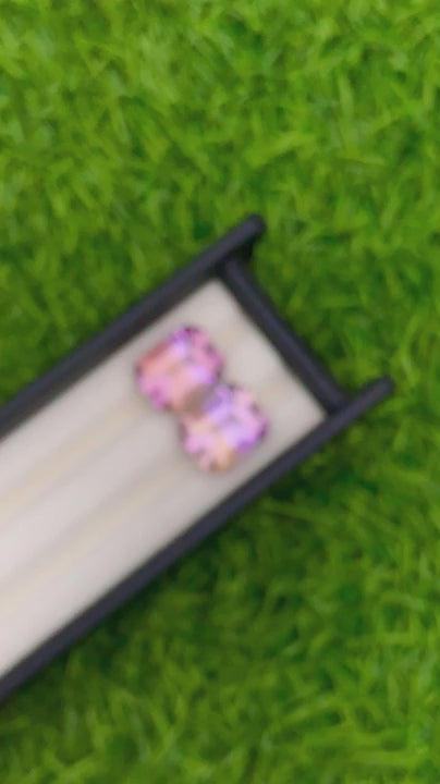 Natural Ametrine matching pair 21.40 carats, emerald cut, purple-orange bi-color gemstones from Bolivia, untreated