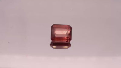 Natural Red Apatite 2.03 carats, emerald cut, light orangy red gemstone, untreated