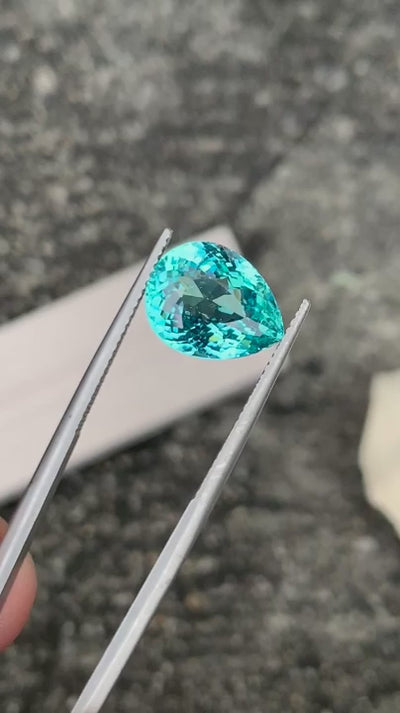 Natural Paraiba tourmaline, 6.55 carats, pear cut, faceted, greenish-blue Paraiba color, Mozambique origin, GRS certified