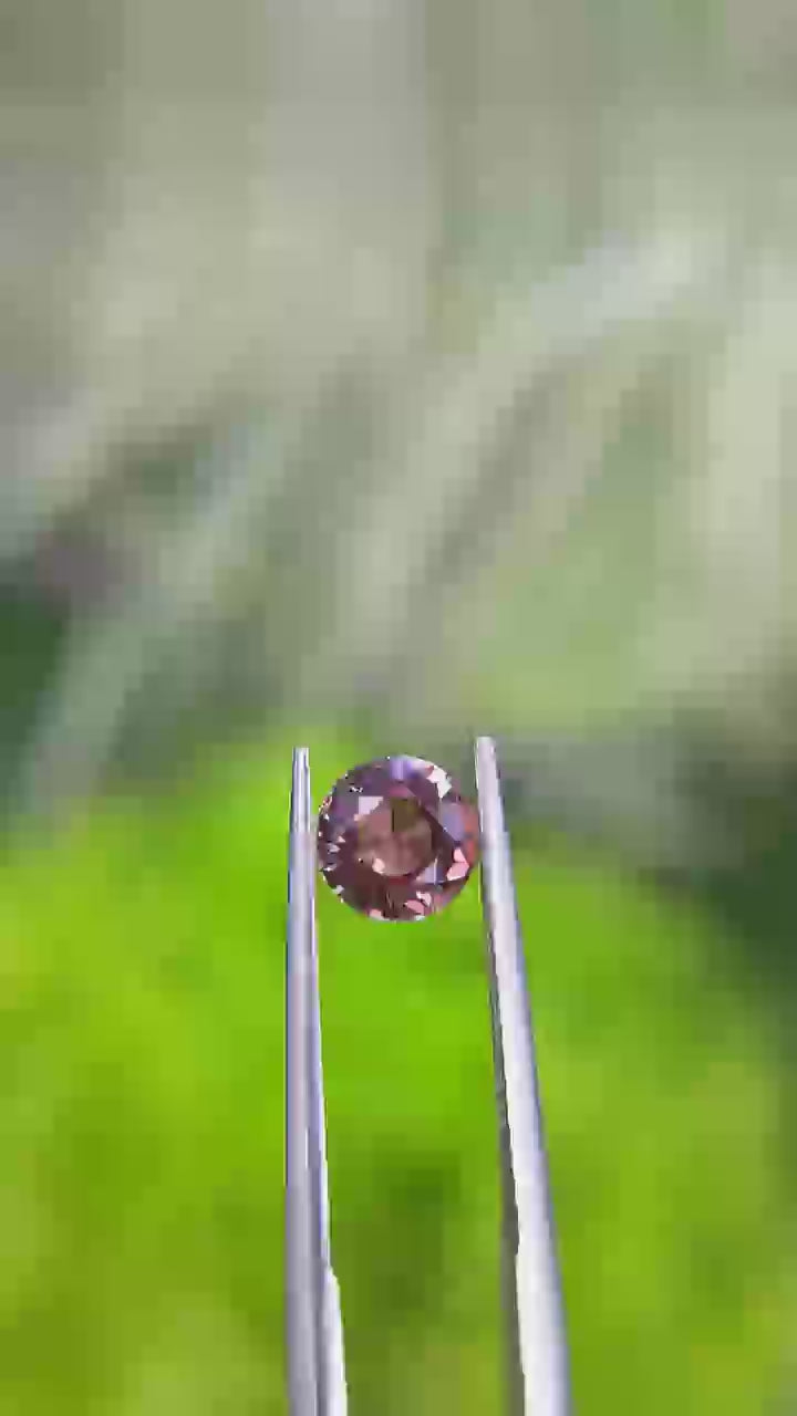 Natural Padparadscha sapphire, 1.07 carats, round mixed brilliant cut, untreated, orangy-pink color, certified