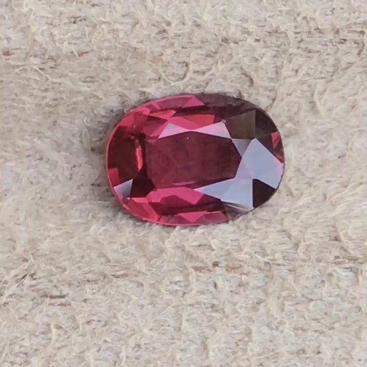 Natural rhodolite garnet, 1.10 carats, oval cut, SI clarity, untreated, red gemstone