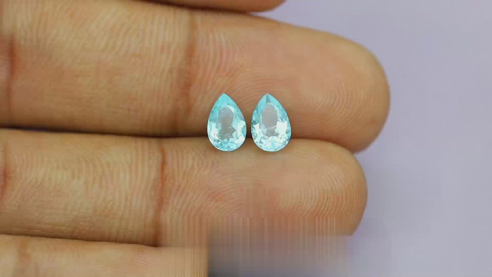 Natural Paraiba tourmaline pair, 1.21 carats total, pear cut, heated, greenish-blue, GIA certified