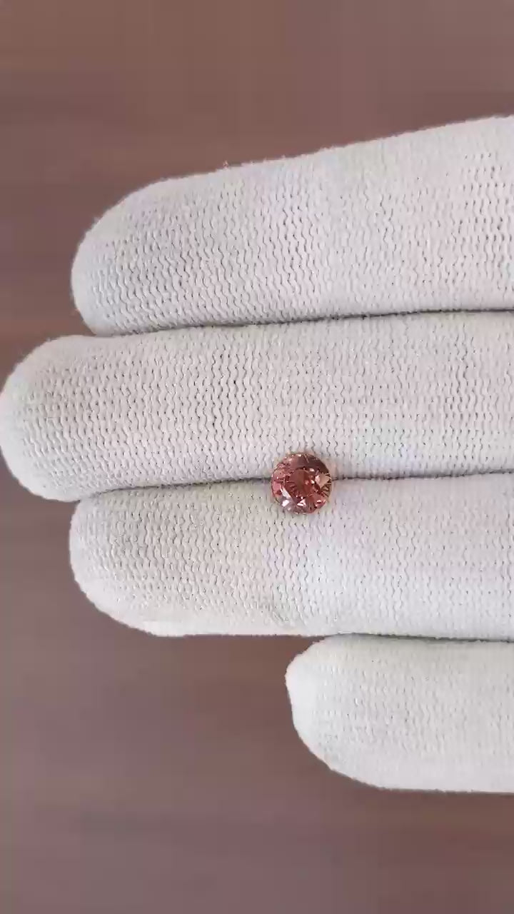 Natural Padparadscha sapphire, 1.07 carats, round mixed brilliant cut, untreated, orangy-pink color, certified