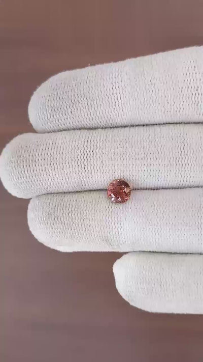 Natural Padparadscha sapphire, 1.07 carats, round mixed brilliant cut, untreated, orangy-pink color, certified