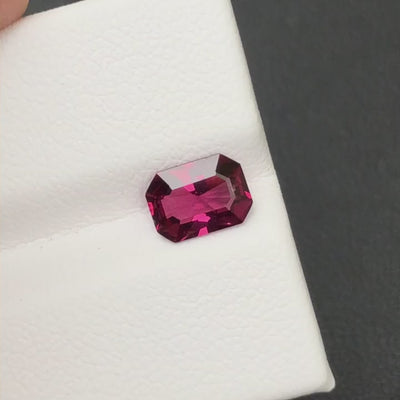 Natural rhodolite garnet, 1.25 carats, octagonal cut, VVS clarity, untreated, pinkish-red color