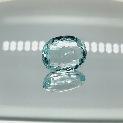 Natural aquamarine, 12.11 carats, oval cut, eye clean clarity, untreated, vivid blue