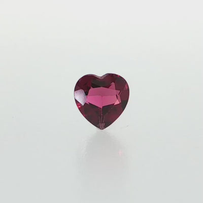 Natural rhodolite garnet, 1.36 carats, heart cut, slightly purplish red color, transparent, ČGL certified gemstone