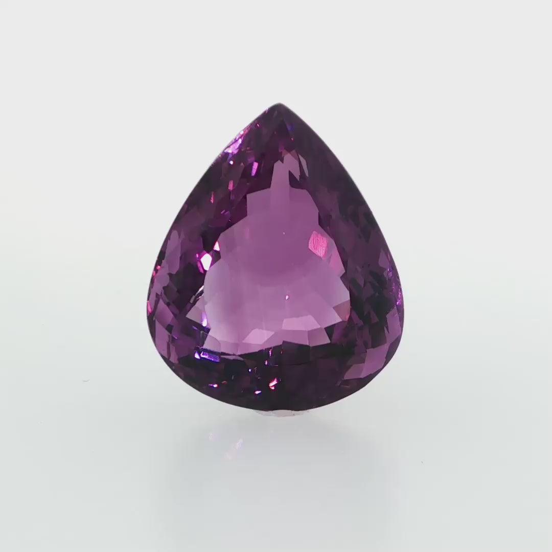 Natural amethyst, 40.07 carats, pear cut, clarity: eye clean, vibrant purple color, measuring 25.39 × 21.24 × 13.74 mm