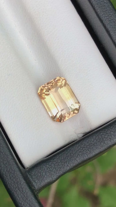 Gold color natural topaz 6.45 ct emerald cut