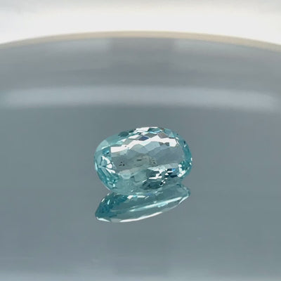Natural aquamarine, 11.06 carats, oval cut, eye clean clarity, untreated, vivid blue