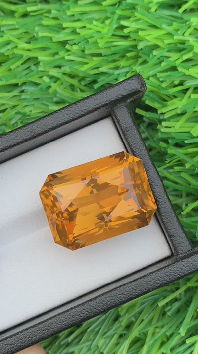 Natural citrine, 32.35 carats, cushion cut, VVS clarity, heated, yellow / orange