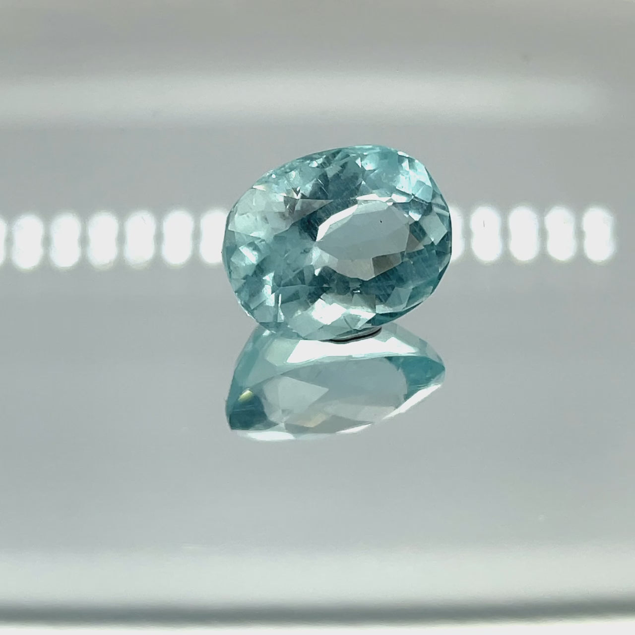 Natural aquamarine, 14.89 carats, oval cut, eye clean clarity, untreated, vivid blue