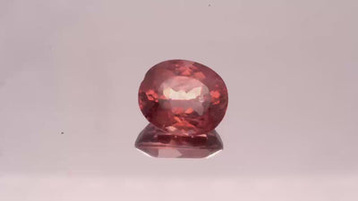 Natural Red Apatite 3.13 carats, oval cut, light orangy red gemstone, untreated