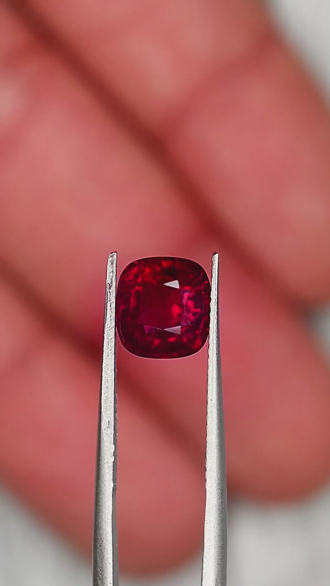 Natural roby 2.57 ct in tweezers