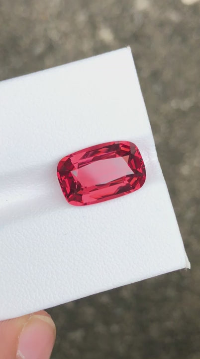 Natural spinel, 6.42 carats, cushion cut, untreated, pinkish-orange color, GRS certified
